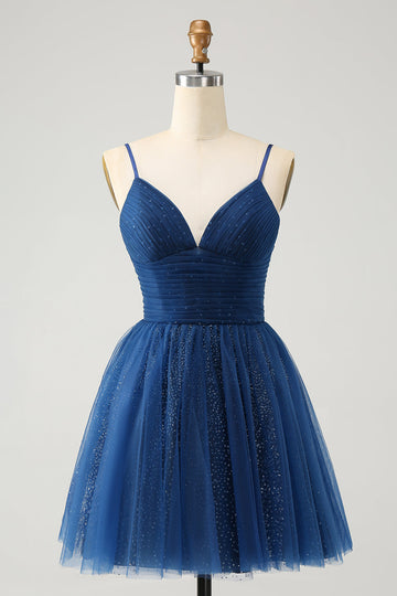Vestido de cóctel azul marino con tirantes finos y espalda con cordones de tul